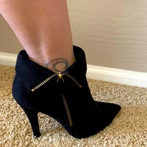 Black suede bootie with gold trim